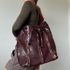 Crystalyn Kae Burgundy faux leather shoulder bag